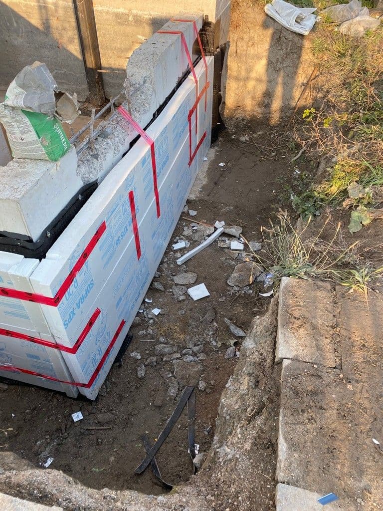 Colphene Torch'n Stick Below Grade Waterproofing and Soprema XPS Insulation at Eireann Quay