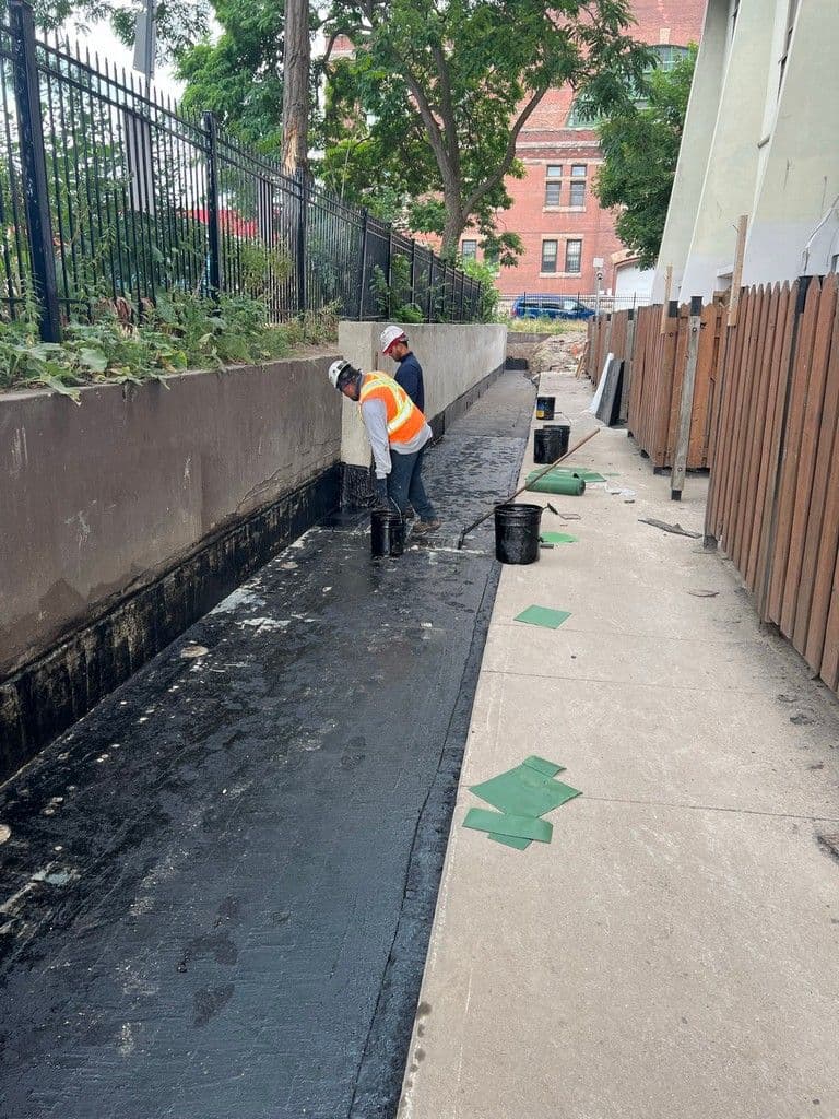 Waterproofing being applied