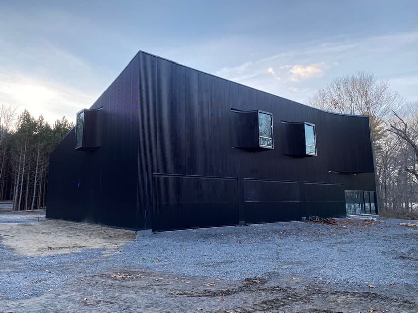 GH3 Architecture -- Pure Building Group Builder -- Corrugated Siding Installation