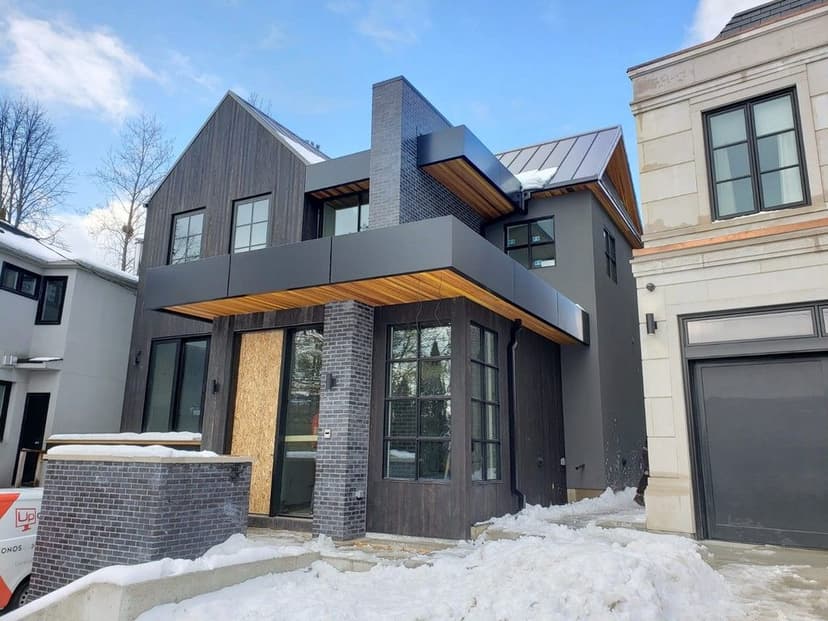 ACM Panel and Standing Seam Roof for Day Custom Homes