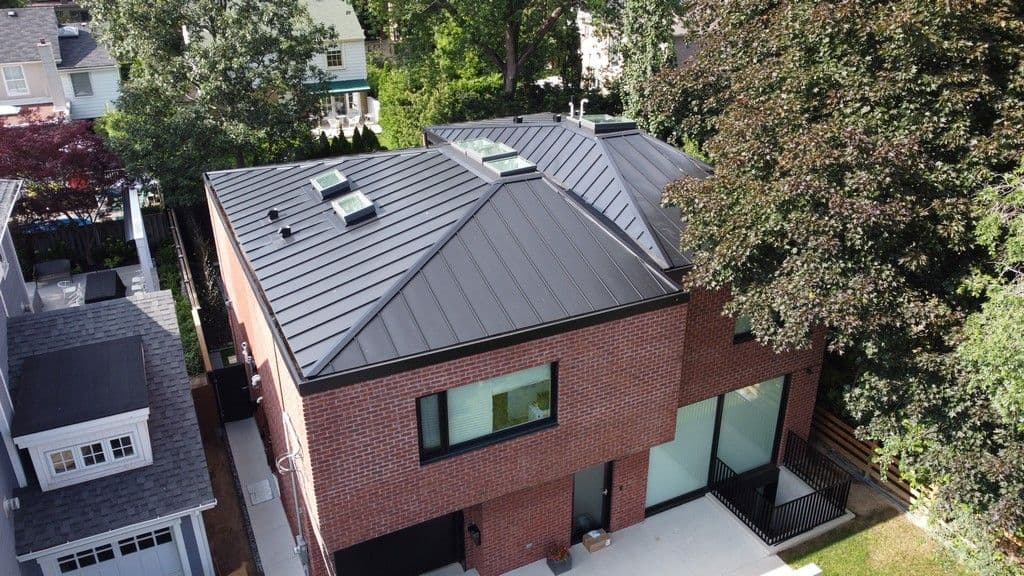 AC Studio Architects & Whitaker Construction Standing Seam Recessed Downpipes and Concealed Gutter